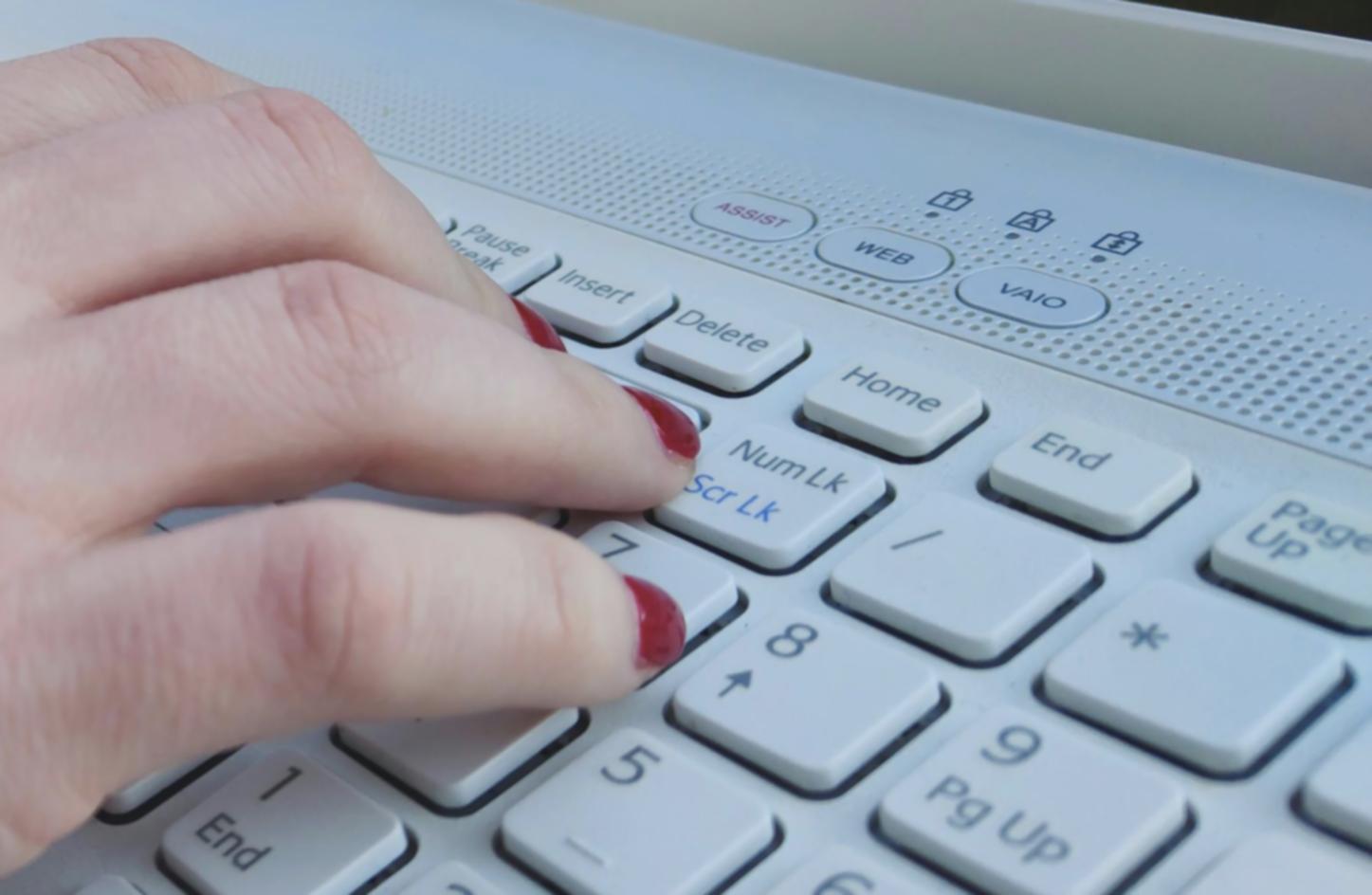Financial planning session with documents and charts spread on table