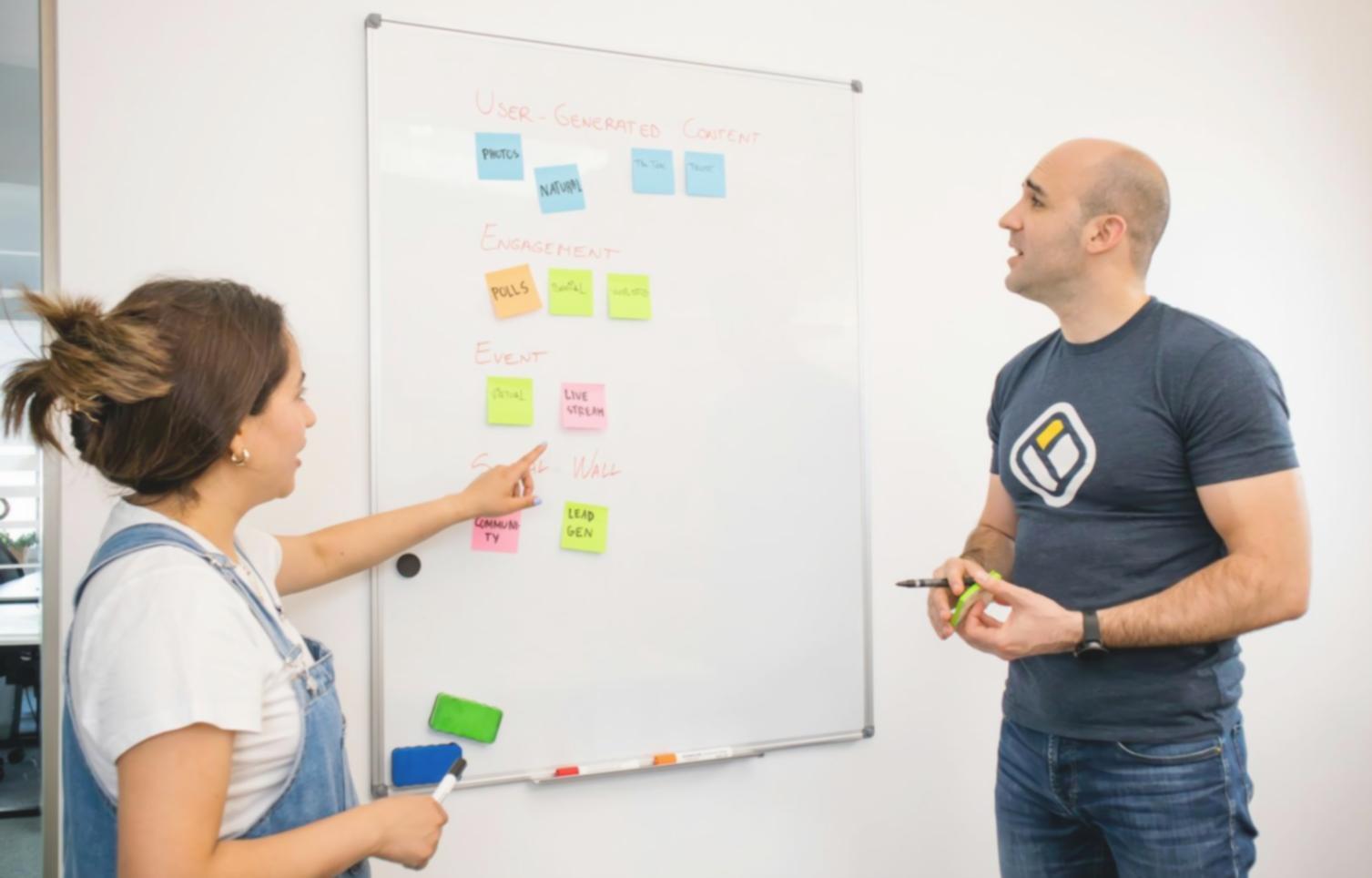 Close-up of hands working with financial calculator and budget worksheet